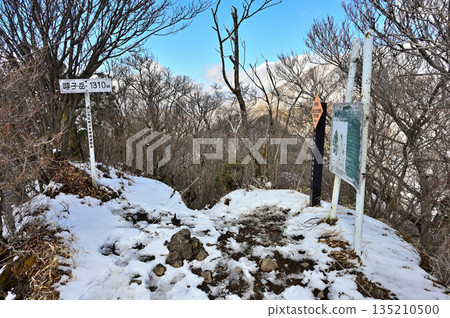 The snow-covered summit of Mt. Yobuko in the Ashitaka mountain range The snow-covered summit of Mt. Yobuko in the Ashitaka mountain range 135210500