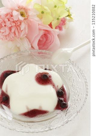Panna cotta with red berry sauce Panna cotta with red berry sauce 135210882