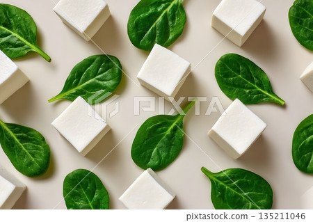 Fresh Spinach Leaves and Cubes on Neutral Background Fresh Spinach Leaves and Cubes on Neutral Background 135211046