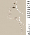 Elegant Profile Illustration of a Woman with Long Hair 135211083