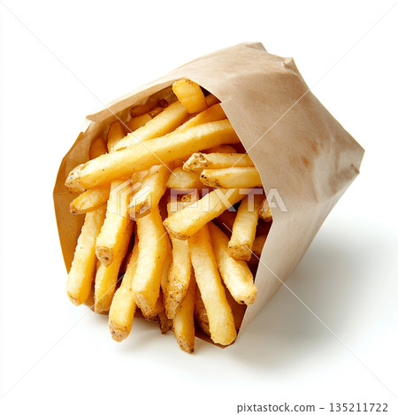 A brown paper bag filled with golden, crispy French fries is shown against a white background. A brown paper bag filled with golden, crispy French fries is shown against a white background. 135211722