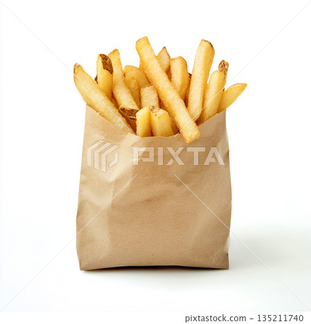 A brown paper bag filled with golden, crispy French fries is shown against a white background. A brown paper bag filled with golden, crispy French fries is shown against a white background. 135211740