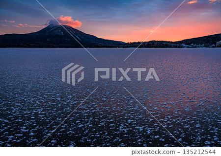 Frost flowers blooming at Lake Akan in the winter morning glow Frost flowers blooming at Lake Akan in the winter morning glow 135212544