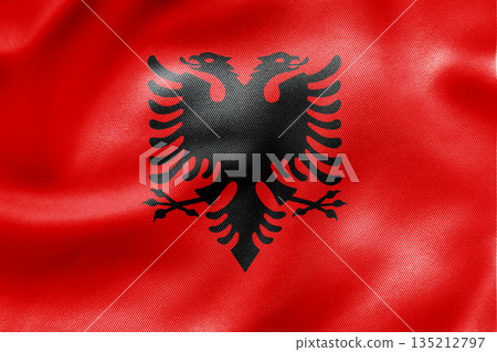 Albania national flag featuring red background and black double headed eagle. Albania national flag featuring red background and black double headed eagle. 135212797