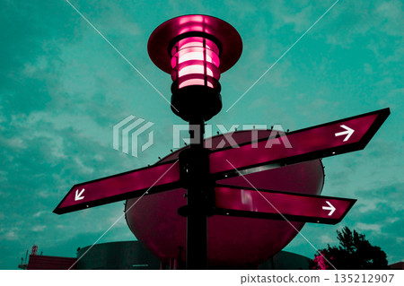 Signpost to the future: Cyberpunk-style signboard and dawn sky Signpost to the future: Cyberpunk-style signboard and dawn sky 135212907