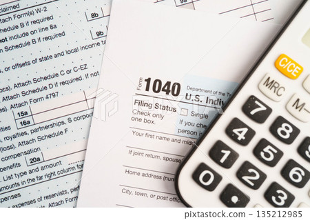 Tax form 1040 U.S. Individual Income Tax Return, business finance concept. Tax form 1040 U.S. Individual Income Tax Return, business finance concept. 135212985