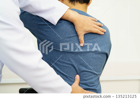 Physical therapy, Asian therapist doctor treat perform pain therapy in hospital. Physical therapy, Asian therapist doctor treat perform pain therapy in hospital. 135213125