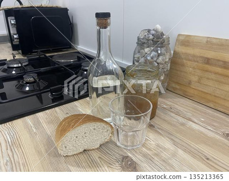 vodka with glasses on the holiday table 135213365