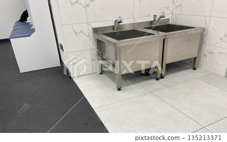 empty locker room for hockey team in stadium 135213371