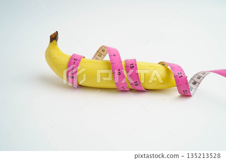 Banana with measuring tape, penis health. 135213528