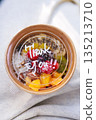 A fruit bowl takeaway cup with a thank you message written on it 135213710