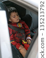 Child sleeping in car 135213792