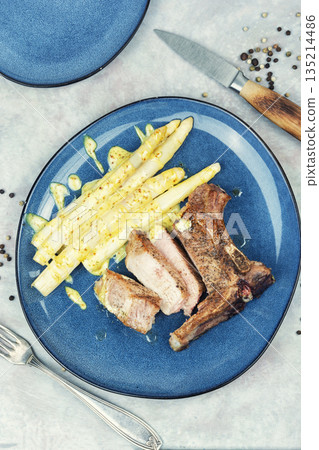 Asparagus with Meat on a Plate Asparagus with Meat on a Plate 135214486