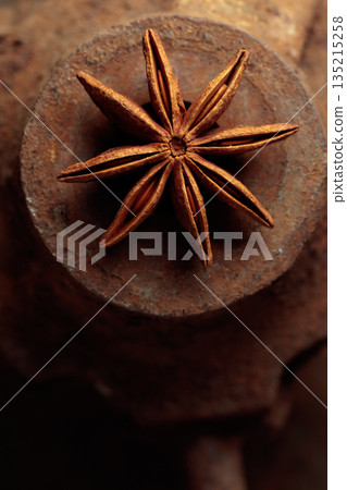 Anise on a rusty background. Anise on a rusty background. 135215258