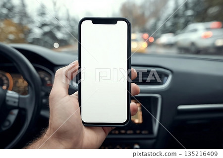 Smartphone mockup, man holding mobile phone in car, selective focus 135216409