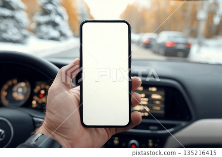 Smartphone mockup, man holding mobile phone in car, selective focus Smartphone mockup, man holding mobile phone in car, selective focus 135216415