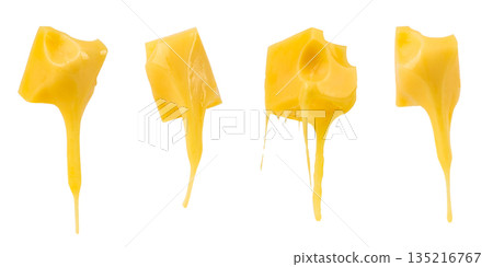 Set of melting yellow cheese cubes with dripping texture isolated on white background 135216767