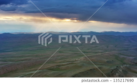 Aerial view of mountains at sunset in Mongolia Aerial view of mountains at sunset in Mongolia 135217690