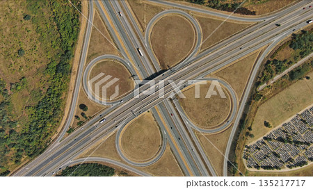 Road interchange or highway intersection. Junction transportation Road interchange or highway intersection. Junction transportation 135217717