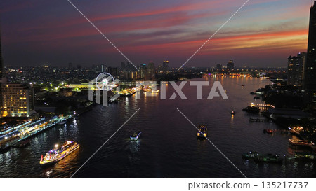Skyscrapers in Bangkok city and river at night 135217737