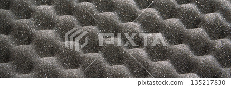 Close-up of black acoustic foam panels for soundproofing and noise reduction Close-up of black acoustic foam panels for soundproofing and noise reduction 135217830