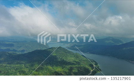 Aerial view on Danube river and mountains under clouds 135217901