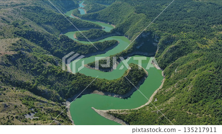 Curved meanders in canyon of Uvac river Serbia Curved meanders in canyon of Uvac river Serbia 135217911