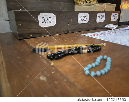 orthodox bracelet and candles in chirch 135218260