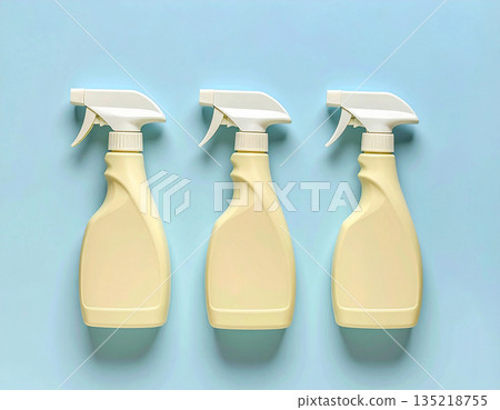 Product focused. Yellow sprays in a row. Disinfectant, glass cleaner, all-purpose surface cleaner. Mockup for branding cleaning product. Product focused. Yellow sprays in a row. Disinfectant, glass cleaner, all-purpose surface cleaner. Mockup for branding cleaning product. 135218755