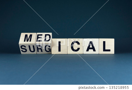 Wooden blocks arranged to form the words medical and surgical 135218955