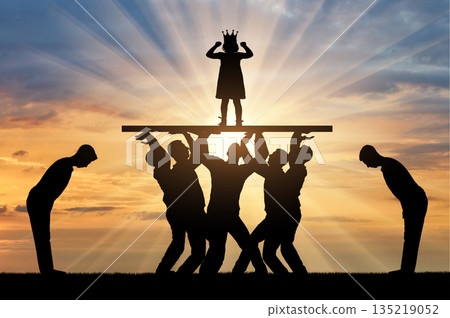 Childish selfishness. Crowd of servants is holding and worshiping a selfish child girl standing on a pedestal 135219052