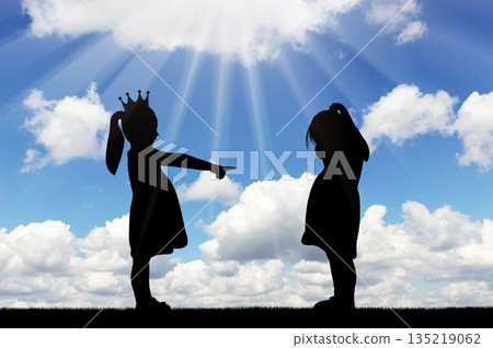 School bullying. Girl points finger at another crying girl. School bullying. Girl points finger at another crying girl. 135219062