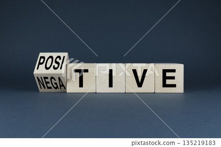 Cubes form the words Positive or negative. Concept of lifestyle and choice of feelings - emotions Cubes form the words Positive or negative. Concept of lifestyle and choice of feelings - emotions 135219183