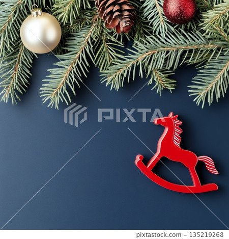 Festive Chinese New Year background with pine branches, ornaments, and a rocking horse decoration Festive Chinese New Year background with pine branches, ornaments, and a rocking horse decoration 135219268