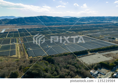 Winter in Ushimado, Okayama Prefecture: Aerial view of the Setouchi Kirei Solar Power Plant, one of Japan's largest solar power plants, located on the former Kinkai salt fields Winter in Ushimado, Okayama Prefecture: Aerial view of the Setouchi Kirei Solar Power Plant, one of Japan's largest solar power plants, located on the former Kinkai salt fields 135219564