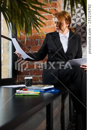 Urban marketing professional organizes campaign documents and tools Urban marketing professional organizes campaign documents and tools 135219792