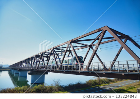Kishu-ji Rapid Train (JR Hanwa Line) running over the Kinokawa Bridge [Wakayama City, Wakayama Prefecture] 135224848