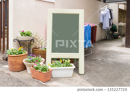 Large blank billboard on a street wall, banners with room to add your own text Large blank billboard on a street wall, banners with room to add your own text 135227729