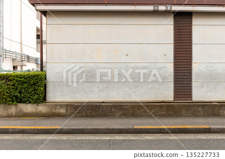 street wall background ,Industrial background, empty grunge urban street with warehouse brick wall 135227733