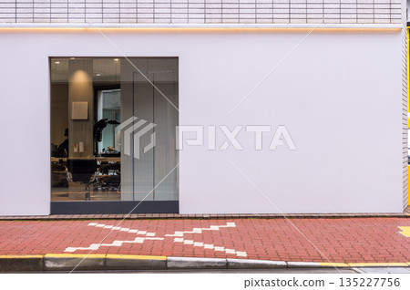 Large blank billboard on a street wall, banners with room to add your own text 135227756