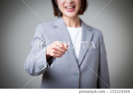 Angry middle-aged business woman 135228269