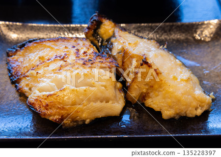 Delicious grilled silver cod in Saikyo style Delicious grilled silver cod in Saikyo style 135228397