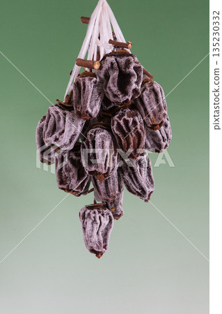 Hanging persimmons: a winter tradition Hanging persimmons: a winter tradition 135230332