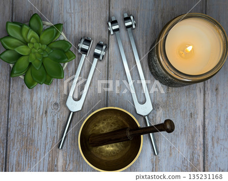 Mindfulness and Meditation Self Care Flat Lay With Candle, Tuning Forks, and Succulent Plant 135231168