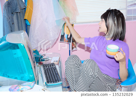 Portrait of a young freelance woman working from home Portrait of a young freelance woman working from home 135232029