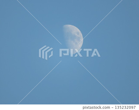 half moon blue sky half moon blue sky 135232097