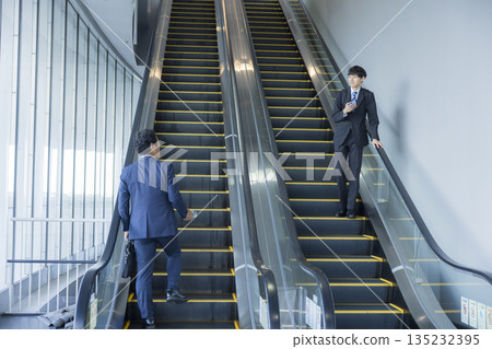 Escalator and businessman 135232395