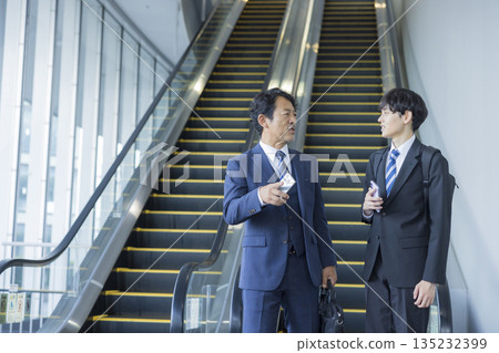 Escalator and businessman 135232399