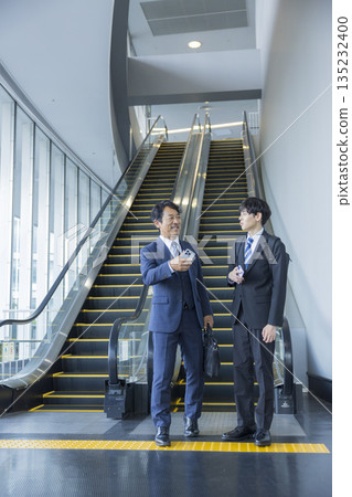 Escalator and businessman 135232400