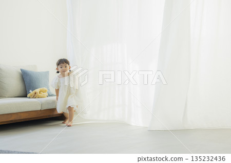Children playing in the living room Children playing in the living room 135232436